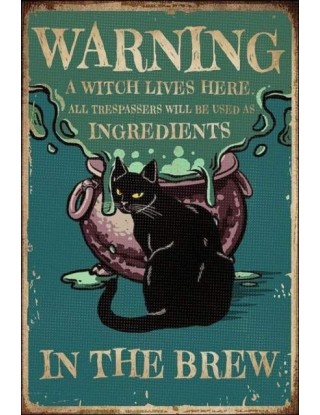 Ostrzeżenie wiedźma mieszka...